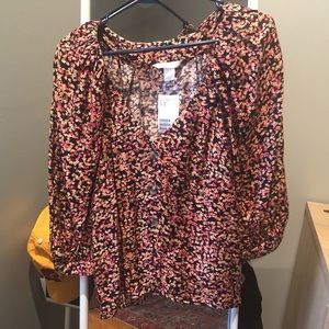 Adorable floral puff sleeve shirt with buttons size M, new with tags